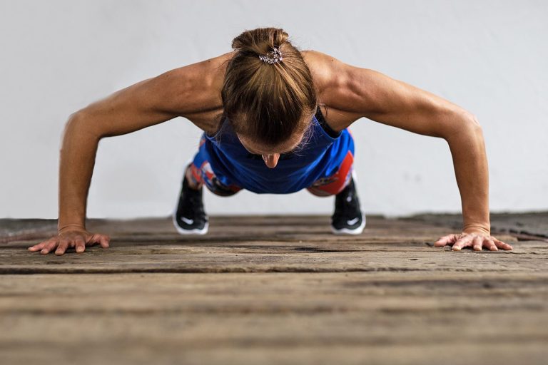 Kerstin Weinzierl doing an excersise with a gymnastics ball