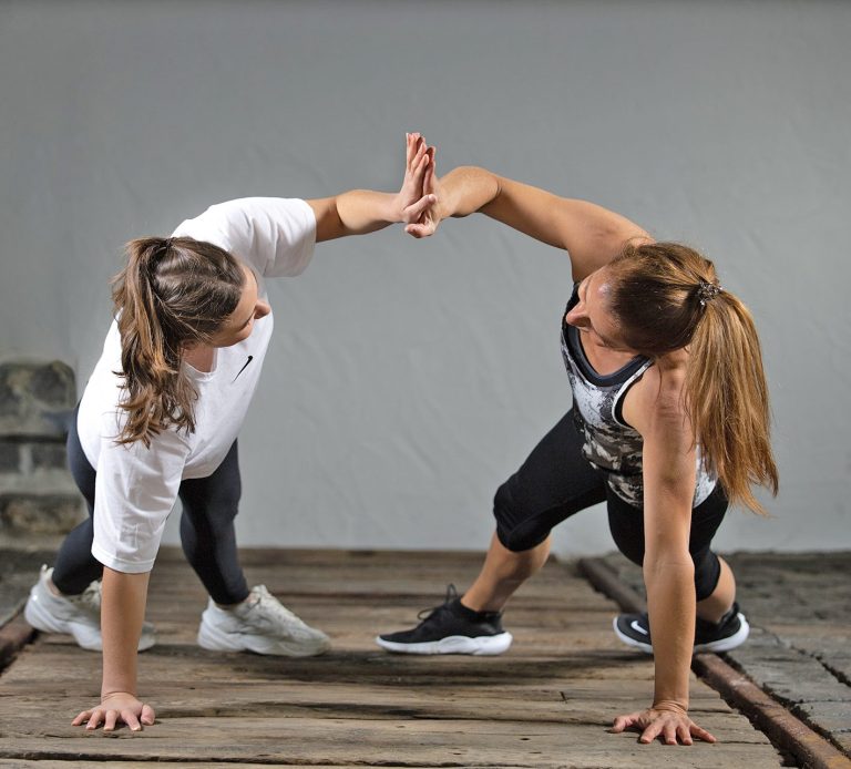 Kerstin Weinzierl and a client working out together and having fun